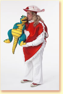 Photo of Lovey Dovey with Grouchy the dragon puppet.